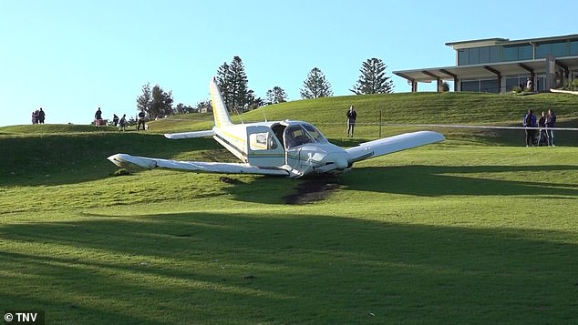 The plane crashed in front of the clubhouse as bystanders rushed over to the plane to help