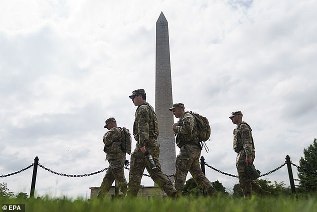 National Guard troops patrol the National Mall on August 20, 2025 as the federal policing in Washington, D.C. enters its second week