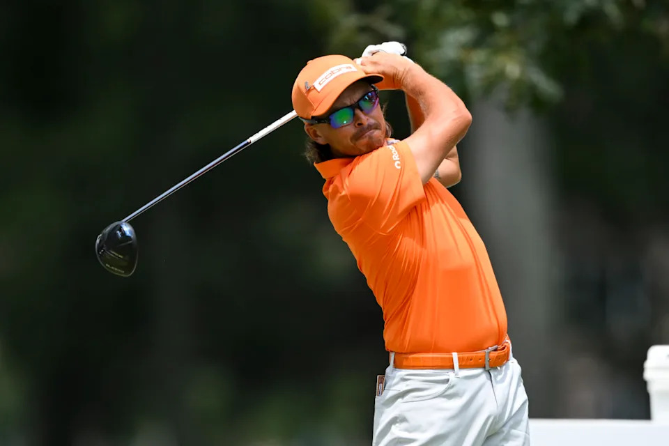 Aug 10, 2025; Memphis, Tennessee, USA; Ricky Fowler plays his shot from the fifth tee during the final round of the FedEx St. Jude Championship golf. Mandatory Credit: Steve Roberts-Imagn Images© Steve Roberts-Imagn Images