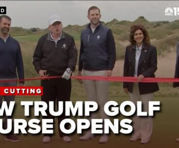 Trump opens new Scotland golf course alongside family