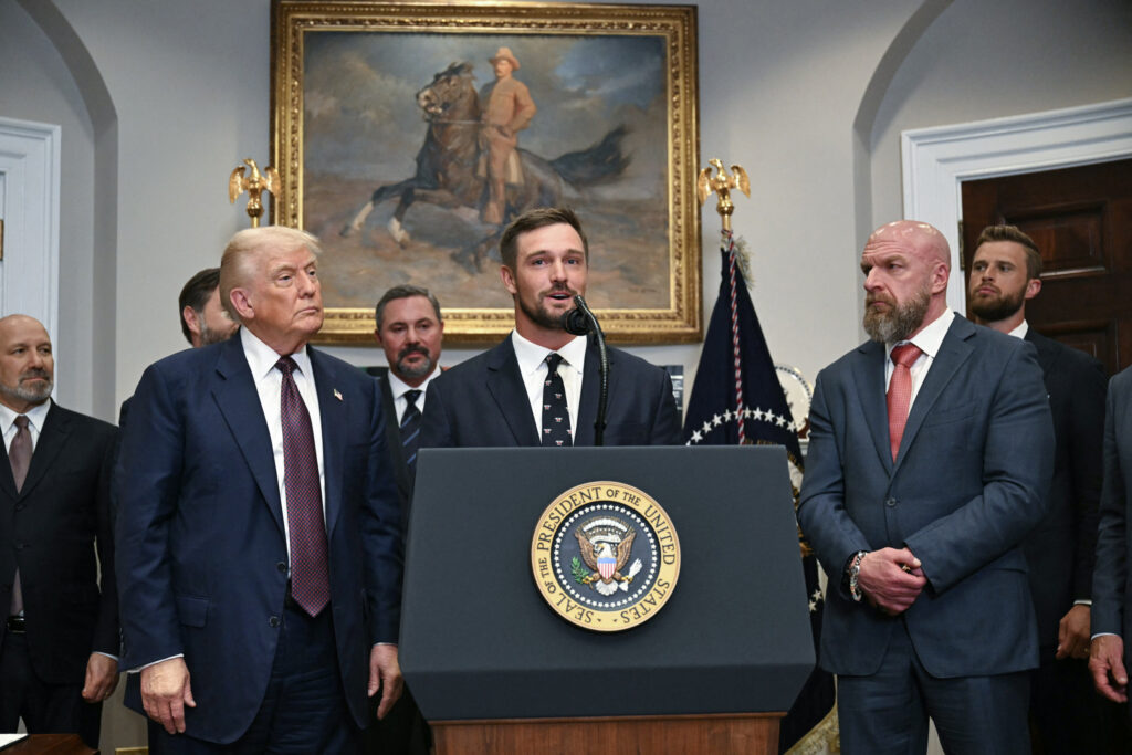 US President Donald Trump (2L) listens as