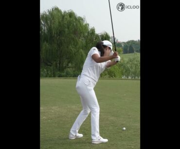 A smooth, flowing swing right through to the finish.   She is Yujin Sung.