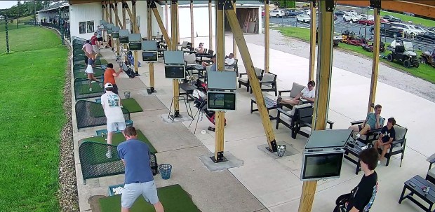 Golfers using the mats on the new expanded driving range at SportsVille in North Ridgeville. (Courtesy of Sportsville)