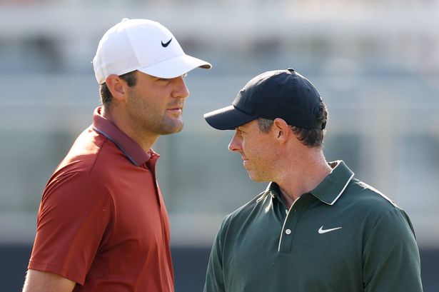 Scottie Scheffler and Rory McIlroy look past one another