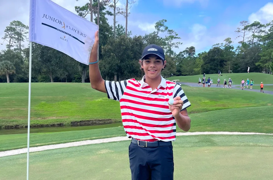 Charlie Woods sinks a hole-in-1.