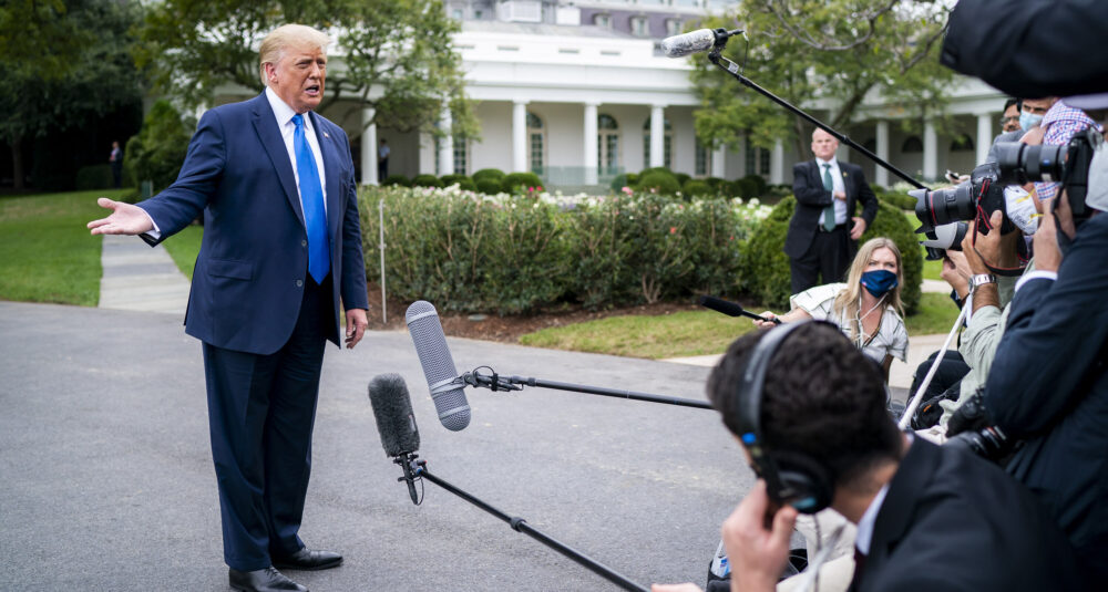 Then-President Donald Trump talks to members of the press along the South Lawn driveway Sept. 24, 2020, prior to boarding Marine One en route to Joint Base Andrews.