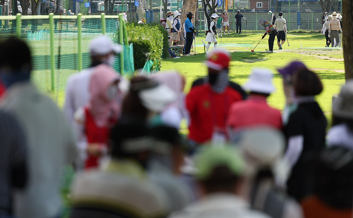 Players play park golf at a course in Daegu on July 31. [YONHAP]