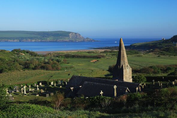 ROCK, CORNWALL - MAY 23:  The view of the par 4, 10th green with par 3, 11th behind and the St Enodoc Church at the St Enodoc Go