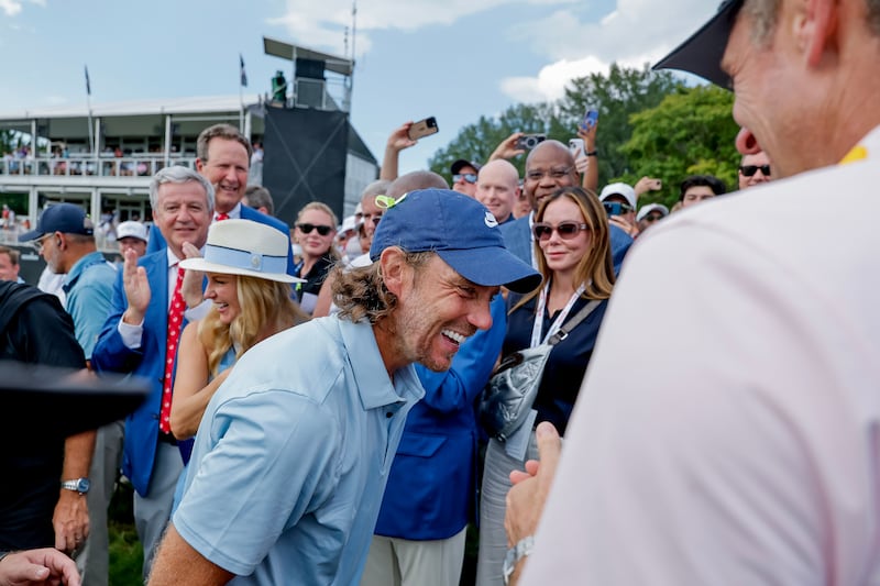 Tommy Fleetwood of England (L) is congratulated by Justin Rose. Photograph: Erik S Lesser/EPA