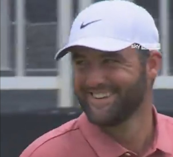 Scheffler looked on and smiled as McIlroy putted for birdie