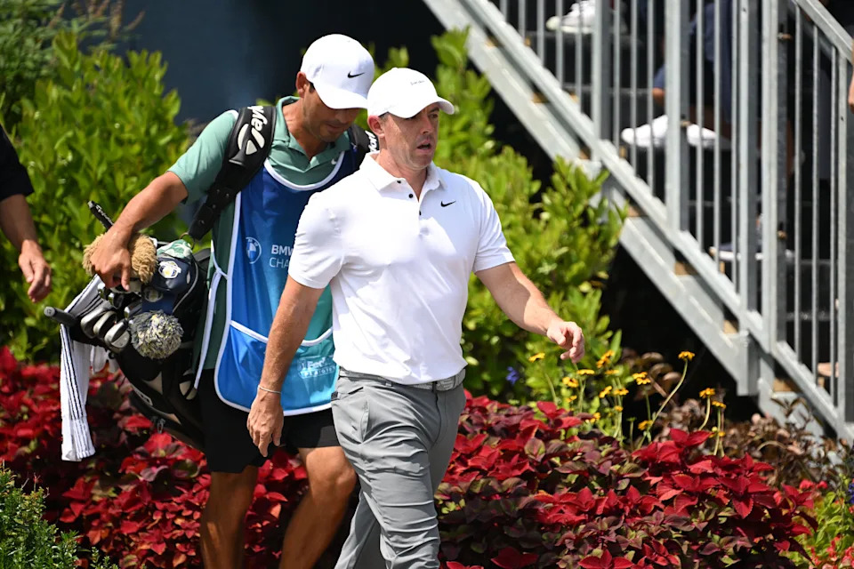 Rory McIlroy walks off the tee box on the first hole during the third round of the BMW Championship golf tournament.
