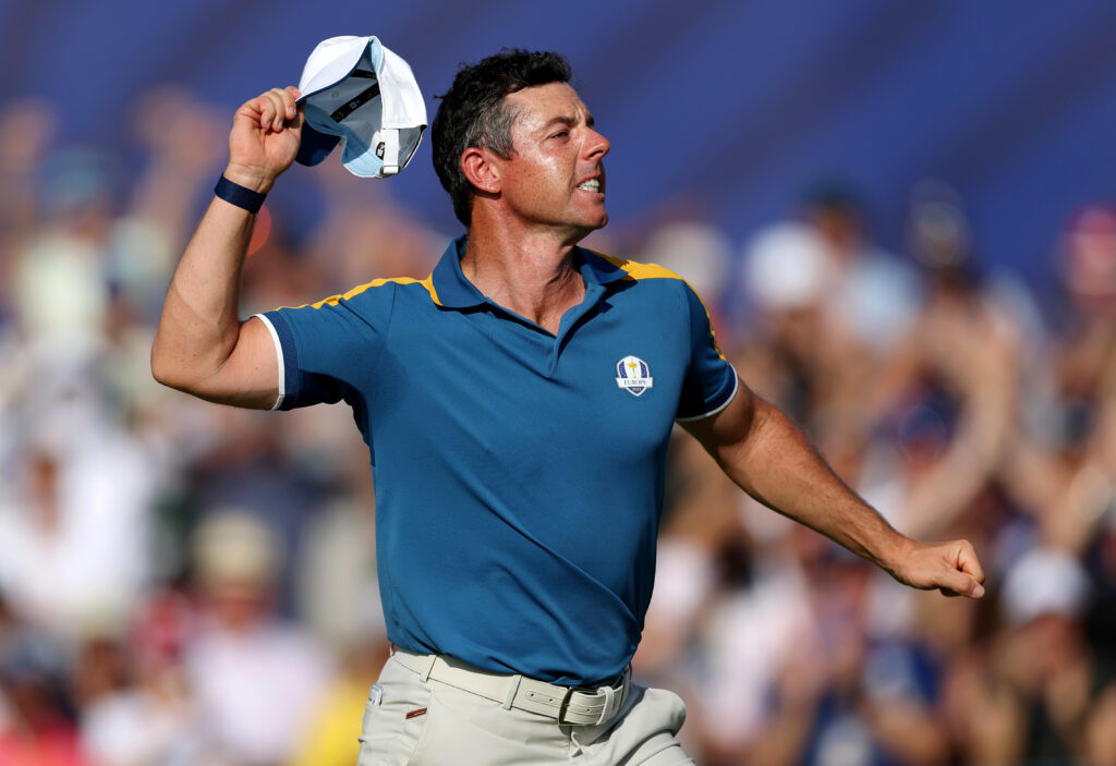 Rory McIlroy of Team Europe celebrates winning his point