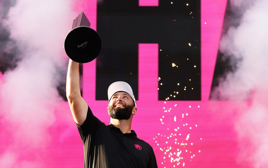 Jon Rahm of Team Legion XIII celebrates with the trophy following victory in the LIV Golf: