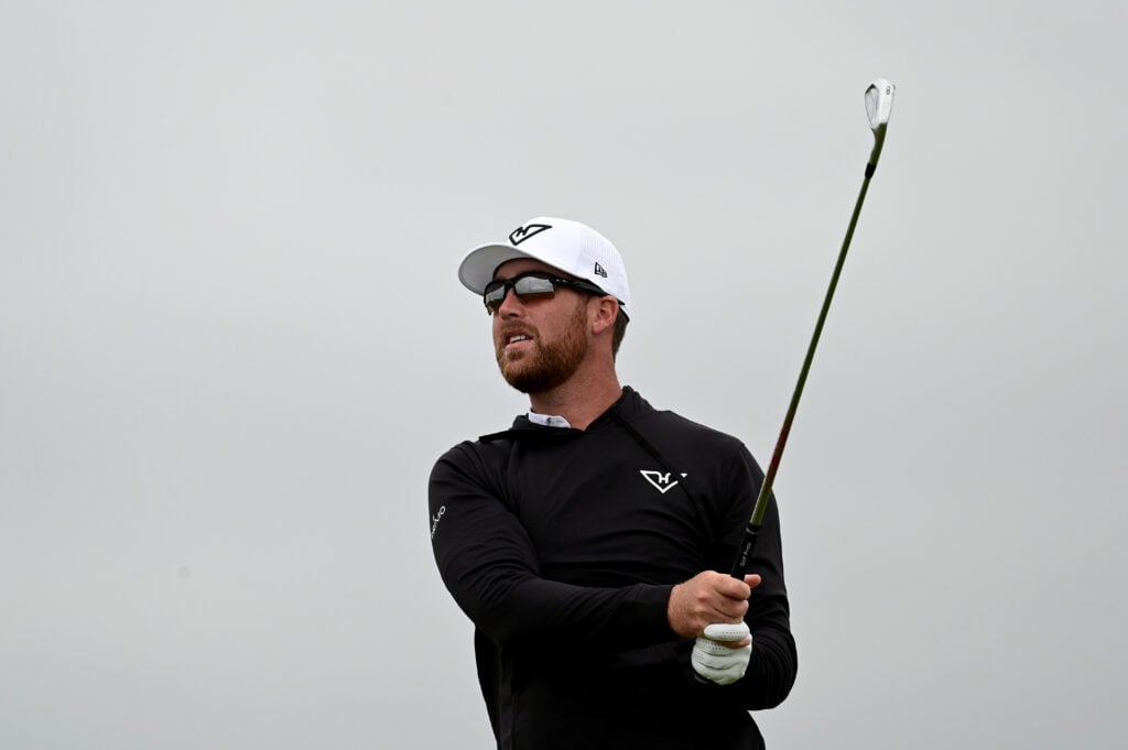 Andy Ogletree hits an approach shot at West Lancashire during Open qualifying