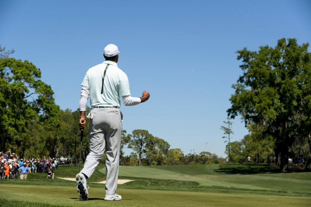 Tiger Woods celebrates his par putt during the second round of the 2018 Valspar Championship