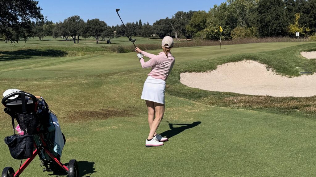 Lauren Katims hitting a fairway shot