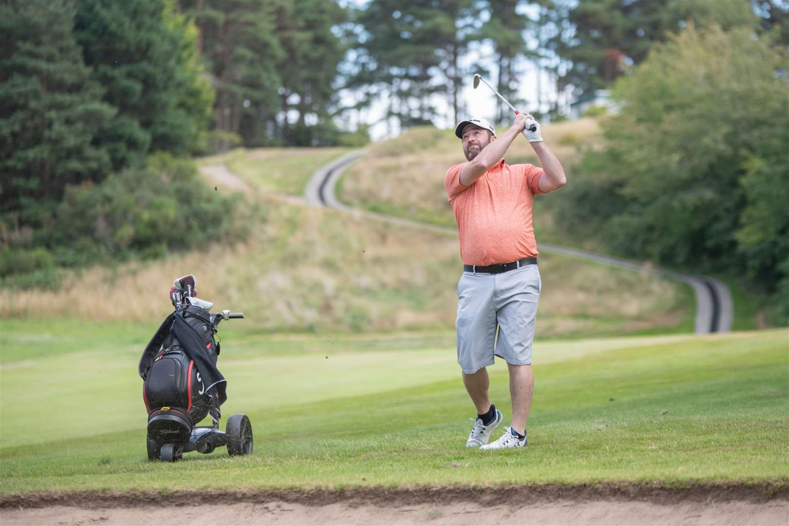 John Mitchell plays down the first fairway. Forres Golf Club's Five Day Open 2025. Picture: Daniel Forsyth.