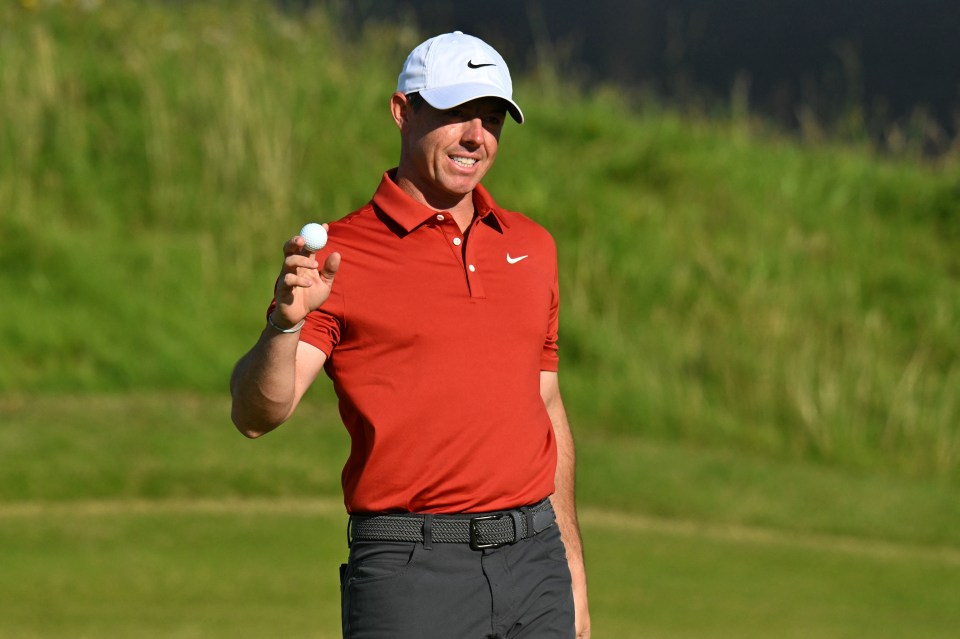 TOPSHOT - Northern Ireland's Rory McIlroy reacts after holing out on the 17th green on day three of the 153rd Open Championship at Royal Portrush golf club in Northern Ireland on July 19, 2025. (Photo by ANDY BUCHANAN / AFP) / RESTRICTED TO EDITORIAL USE (Photo by ANDY BUCHANAN/AFP via Getty Images)