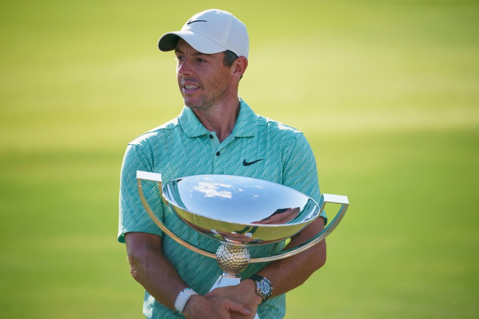 ATLANTA, GEORGIA - AUGUST 28: Rory McIlroy holds the FedExCup trophy after the final round of the TOUR Championship at East Lake Golf Club on August 28, 2022 in Atlanta, Georgia. (Photo by Rankin White/PGA TOUR via Getty Images)
