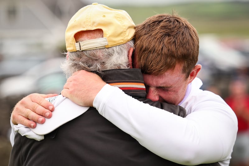 Jonathan Keane celebrates after winning the South of Ireland with the last local winner JD Smyth. Photograph: Ben Brady/Inpho
