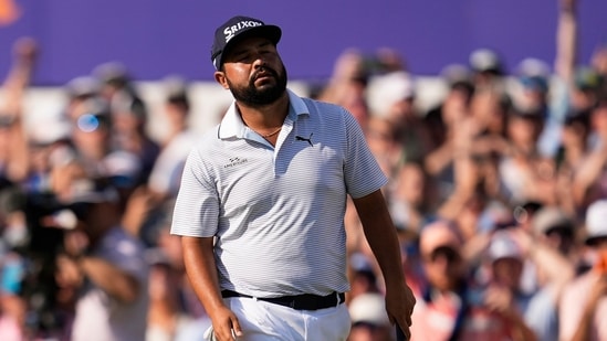 J.J. Spaun reacts to a missed putt on the 18th green during the first playoff hole of the St. Jude Championship golf tournament Sunday.(AP)