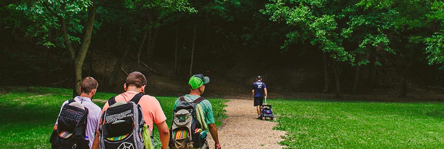 Disc golfers make their way along at The Canyons. 