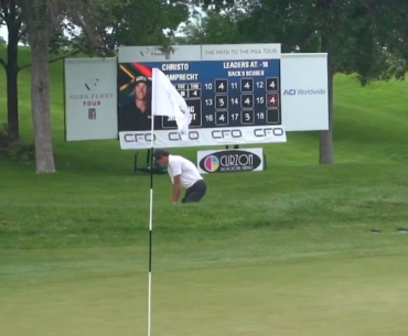 Elite double club throw celebration from Christo Lamprecht and his caddie after chipping in for a Korn Ferry Tour win