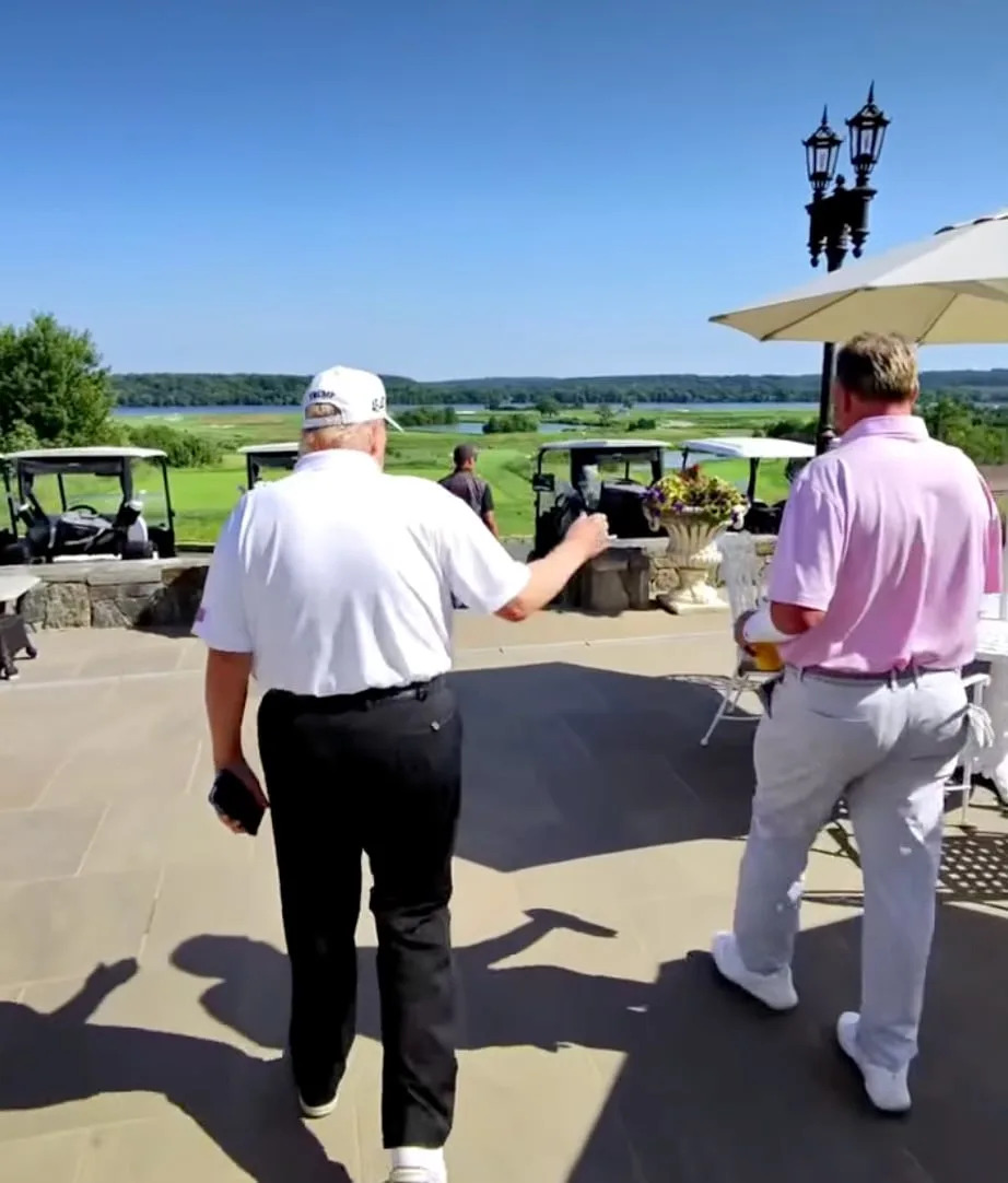 Trump walks with Roger Clemens on Saturday. / Kacy Clemens/Instagram