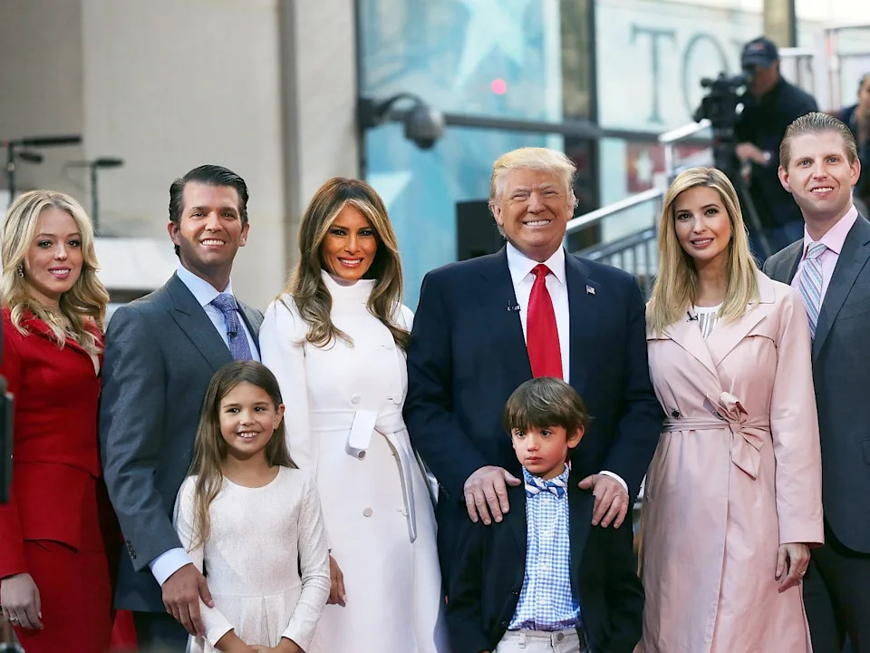 Republican presidential candidate Donald Trump stands with his wife Melania Trump (center left) and from right: son Eric Trump with his wife Lara Yunaska;  Vanessa Haydon and her husband Donald Trump Jr. In the front row are Kai Trump and Donald Trump III, children of Donald Trump Jr. on April 21, 2016 in New York City. The family appeaed at an NBC Town Hall at the Today Show.   (Photo by Spencer Platt/Getty Images)