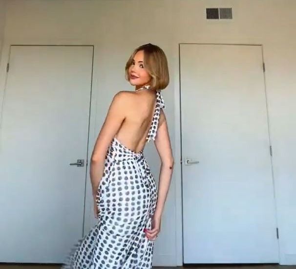 Woman in polka dot dress.