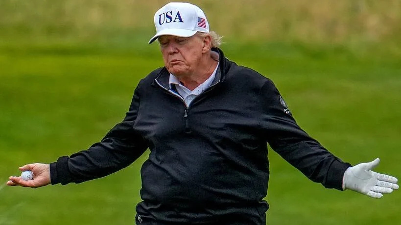 TURNBERRY, SCOTLAND - JULY 27: U.S. President Donald Trump reacts as he plays a round of golf at Trump Turnberry golf course during his visit to the UK on July 27, 2025 in Turnberry, Scotland. U.S. President Donald Trump is visiting his Trump Turnberry golf course, as well as Trump International Golf Links in Aberdeenshire, during a brief visit to Scotland from July 25 to 29.  (Photo by Christopher Furlong/Getty Images)