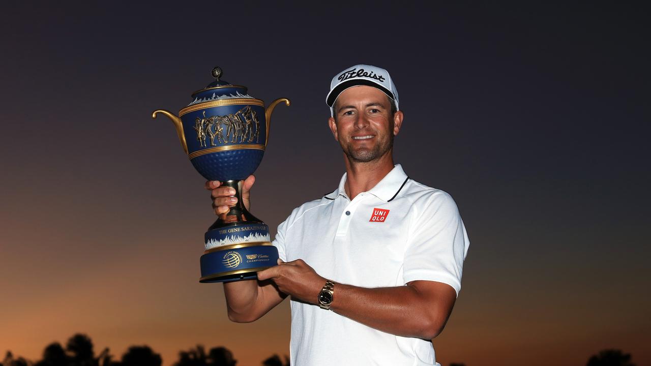 DORAL, FL - MARCH 06: Adam Scott of Australia proudly holds the trophy after his one shot win in the final round of the 2016 World Golf Championship Cadillac Championship on the Blue Monster Course at the Trump National Doral Resort on March 6, 2016 in Doral, Florida. (Photo by David Cannon/Getty Images)