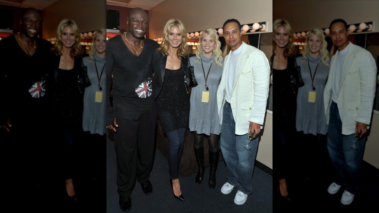 Elin Nordegren posing with Heidi Klum, Seal, and Tiger Woods