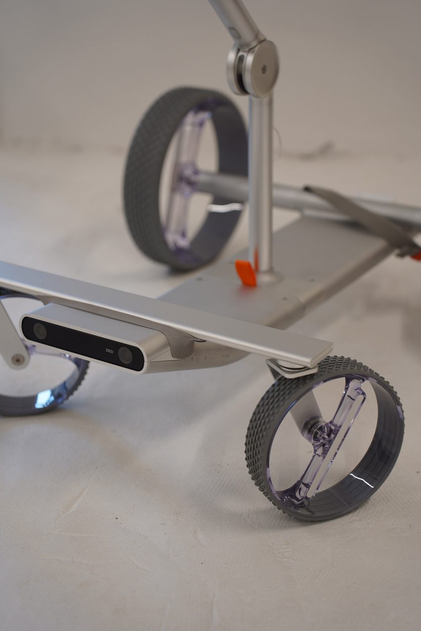 Close-up of camera and wheels on self-driving golf trolley