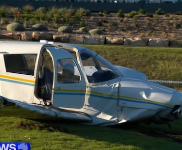 Light plane crash lands on suburban Sydney golf course