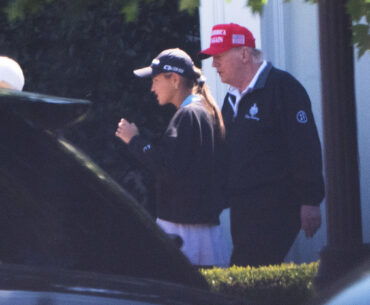 U.S. President Donald Trump walks with his granddaughter Kai Trump at Trump National Golf Club in Sterling, Virginia, on the 30th (local time).