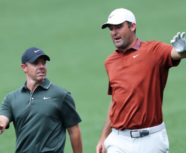 Rory McIlroy (left) and Scottie Scheffler chat during round one of the 2025 PGA Championship