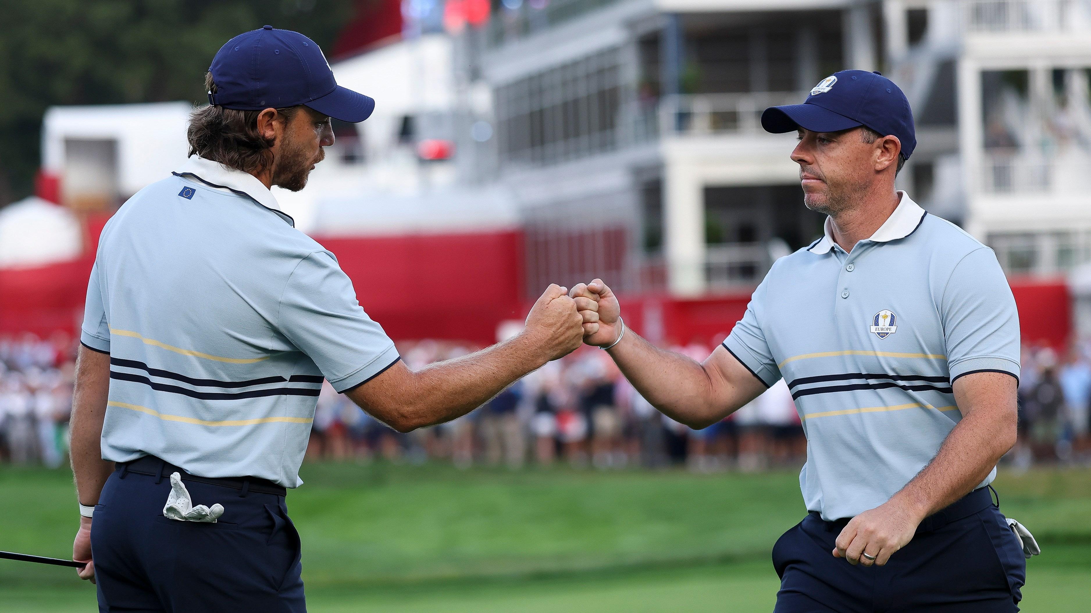 Tommy Fleetwood and Rory McIlroy fist bumping during the Ryder Cup.