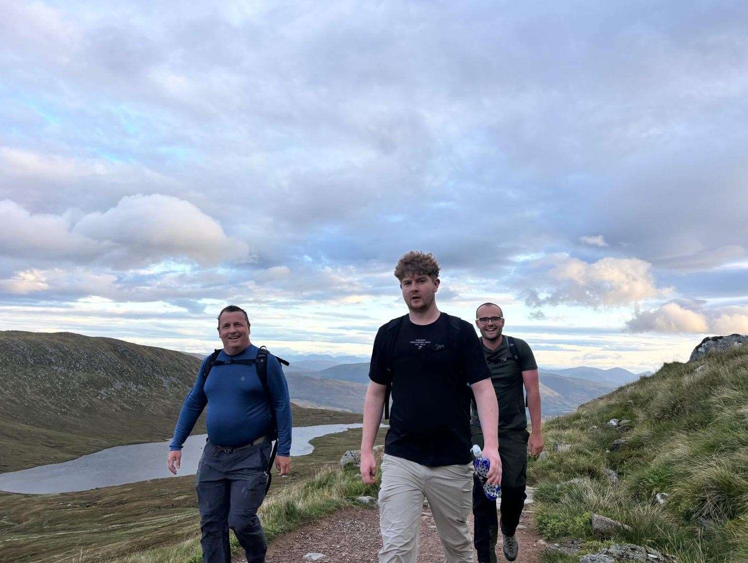 Ian (far left), Tom (middle) and Alfie (back right) on part of the walk. Picture: Submitted