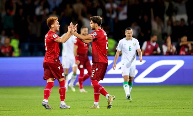 Armenia's Erik Piloyan and Sergei Muradian celebrate their side's second goal