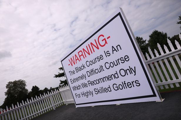 A detailed view of a giant Bethpage Black course warning sign prior to the Ryder Cup 2025