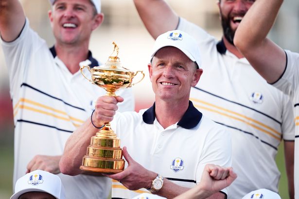 Luke Donald celebrates with the Ryder Cup 