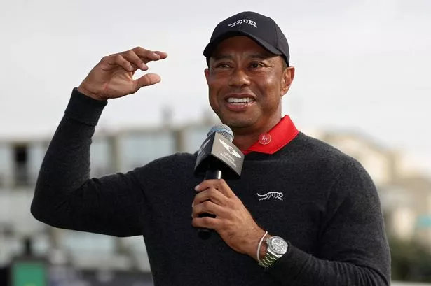 Tiger Woods speaks to the crowd during the trophy ceremony after the final round of The Genesis Invitational 2025 at Torrey Pines Golf Course