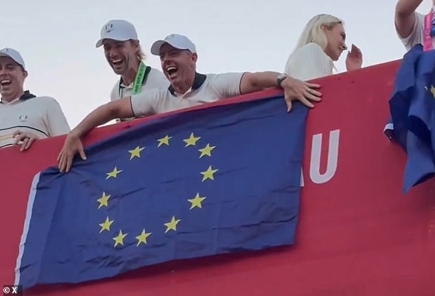 McIlroy looked delighted by his stunt as the crowd below him roared in approval