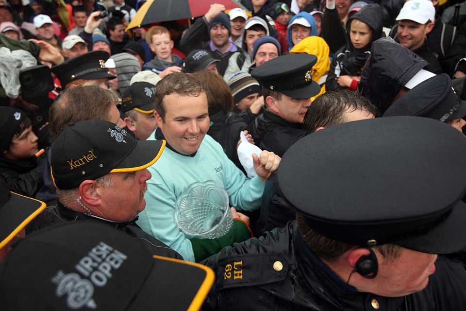 BALTRAY, IRELAND - MAY 17:  Shane Lowry of Ireland with the winners trophy after winning on the third play-off hole during the final round of The 3 Irish Open at County Louth Golf Club on May 17, 2009 in Baltray, Ireland.  (Photo by Ross Kinnaird/Getty Images)