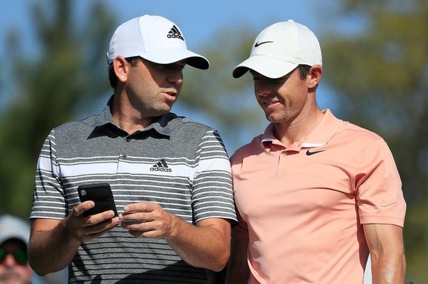 A picture of Sergio Garcia and Rory McIlroy