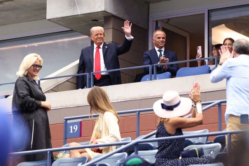 President Donald Trump waves to the crowd ahead of the US Open final earlier this month.