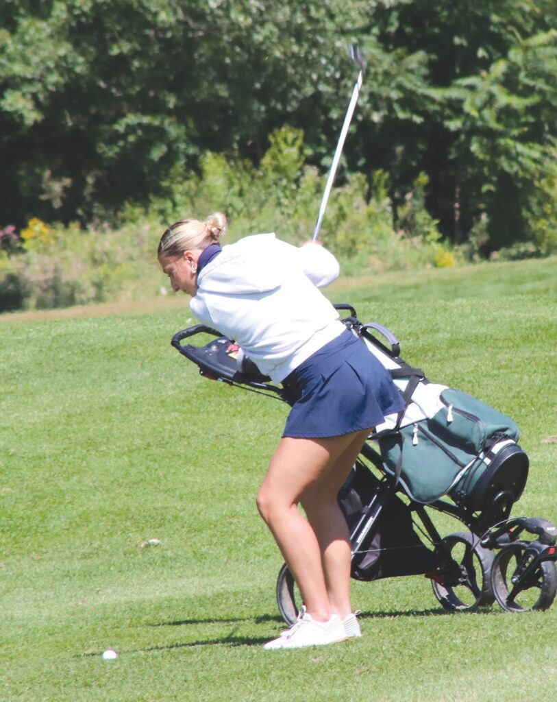 North Branch’s Rylin Fritz puts her body into a shot from the fairway at Castle Creek Golf Course on Sept. 8. Photos by Lisa Paine