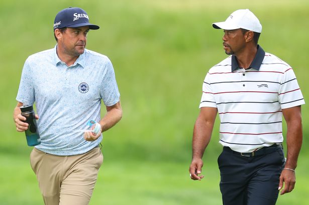 Keegan Bradley of the United States and Tiger Woods of the United States walk together during the second round of the 2024 PGA Championship