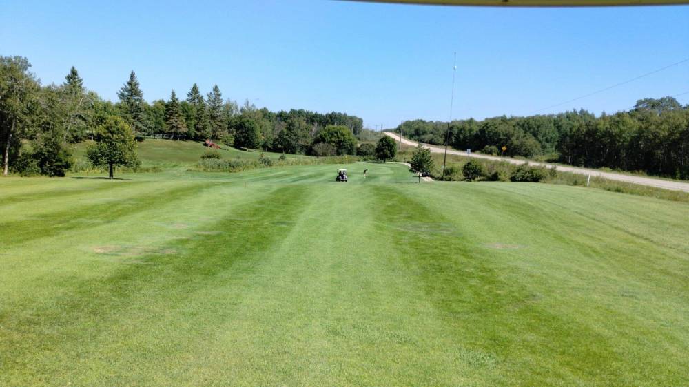Photo by Ryan Desjarlais
                                Hole 5 at the Rossman Lake Golf and Country Club is a nice, wide open fairway, but the green is blind from the tee.